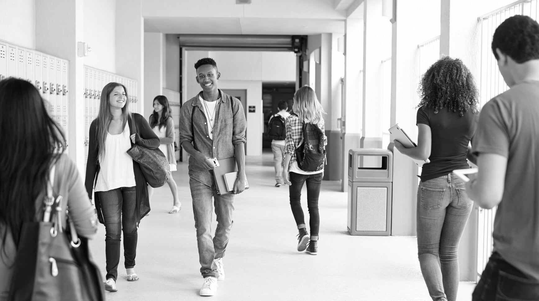 Students walking in a school hallway